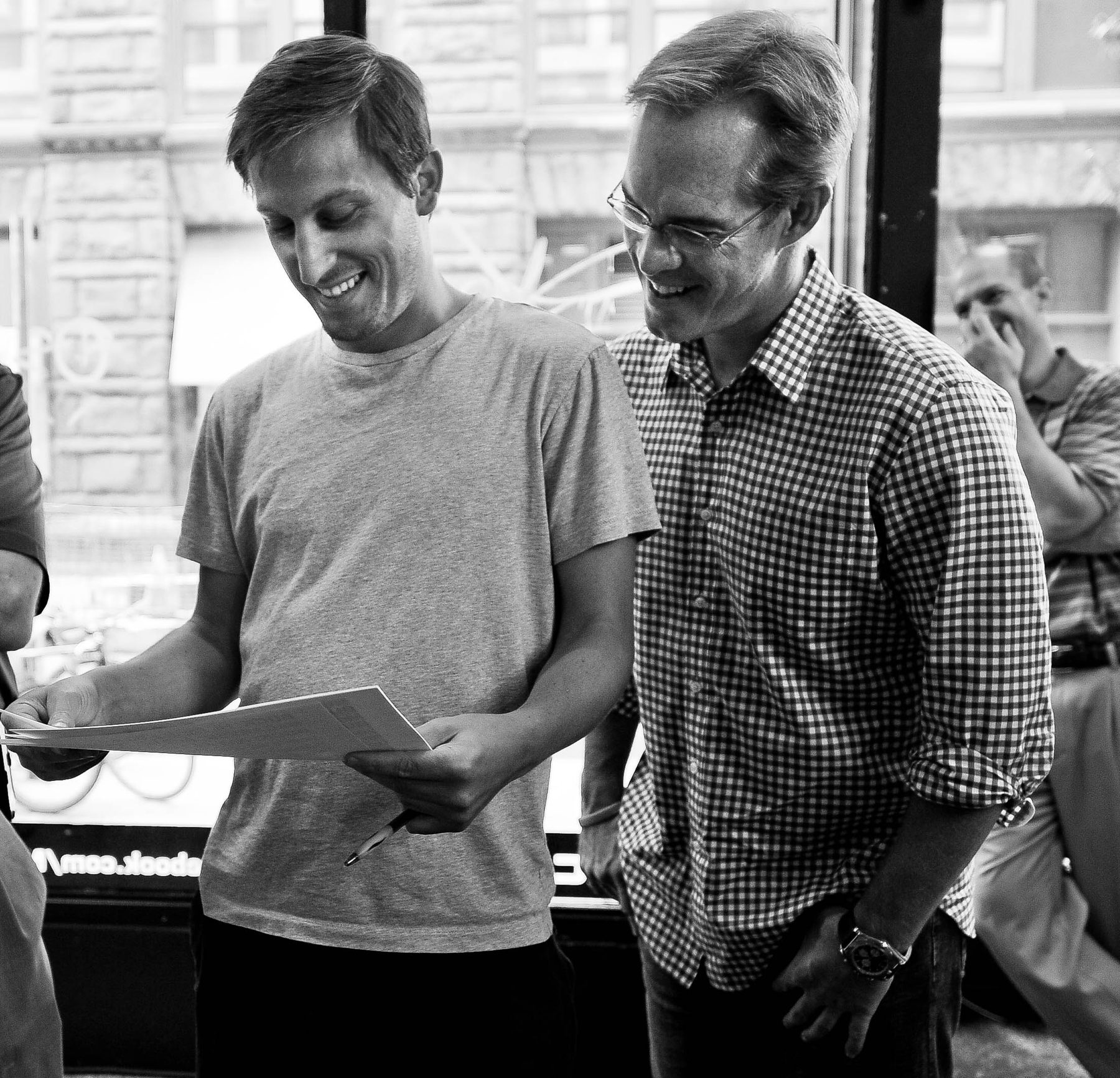 Matthew Waxman reviewing a script with Joe Buck